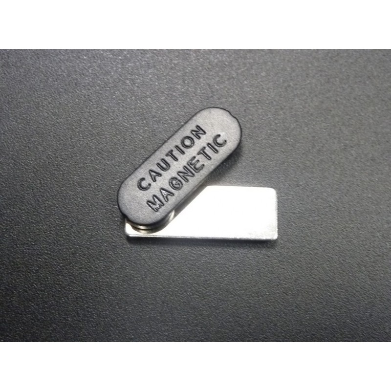 33 x 12 mm plastic base - 2 magnets - Adhesive part - Magnets