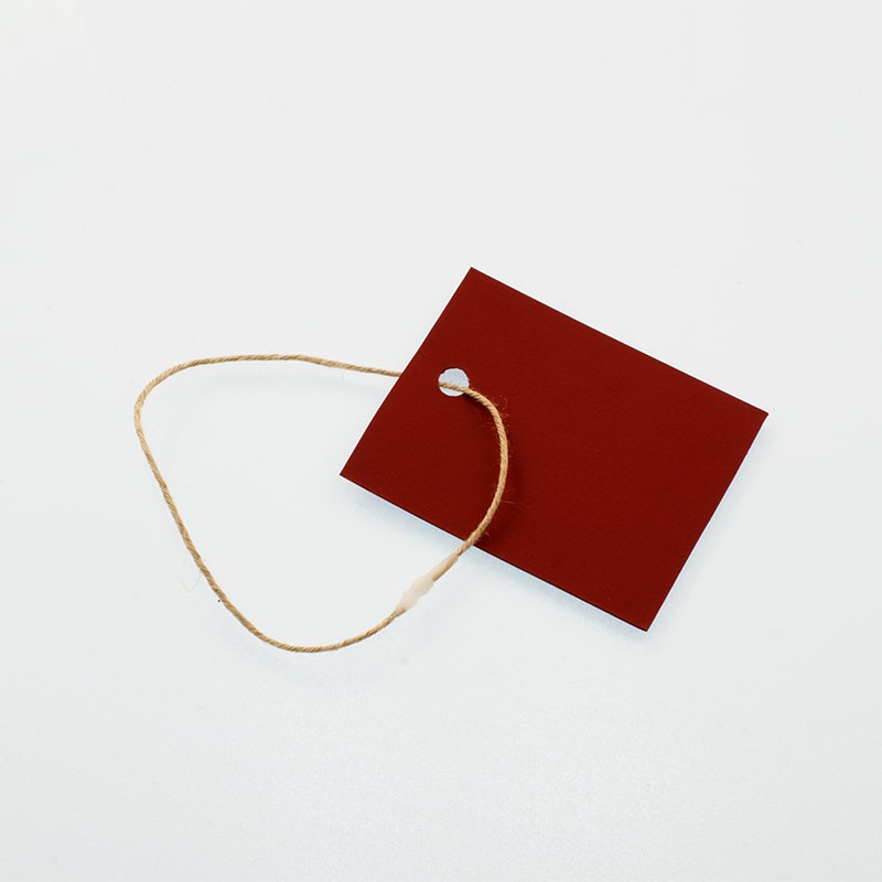 Cotton or linen label attachment: manual attachment - Etigo