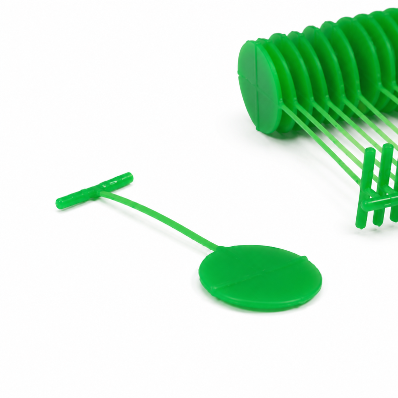Clothes tag attachment for textile gun / Colour green